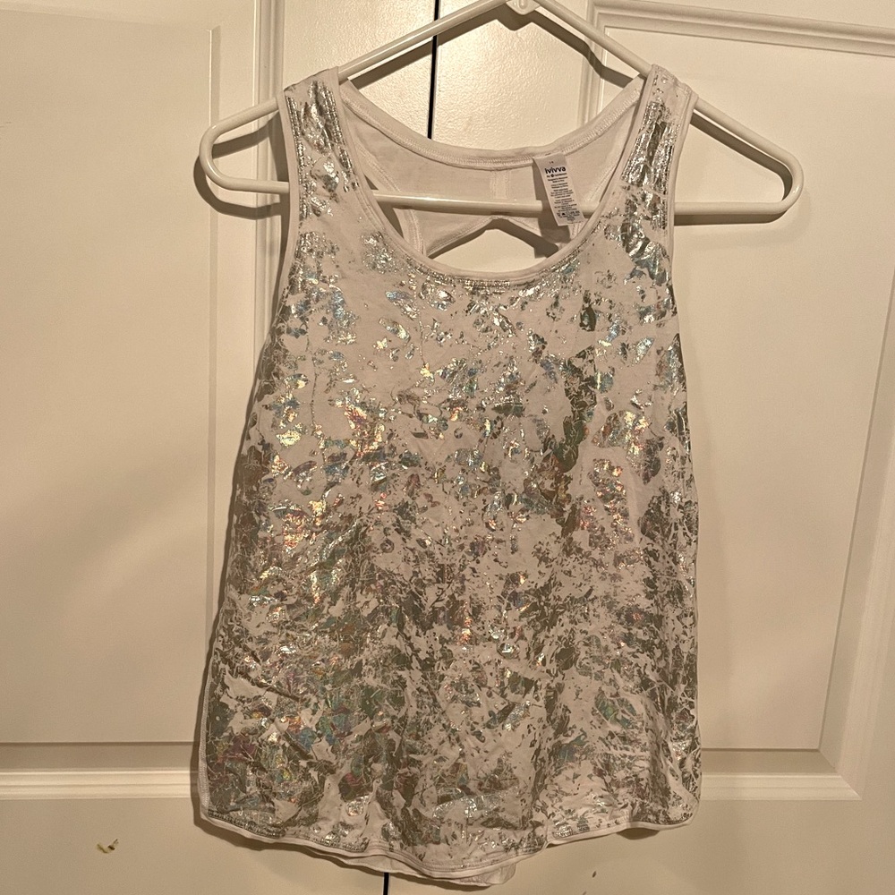 White athletic tank top with silver metallic designs from ivivva by lululemon